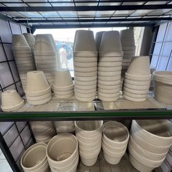 Hornungs True Value Hardware - The selection of granite-colored clay pots are heavily discounted