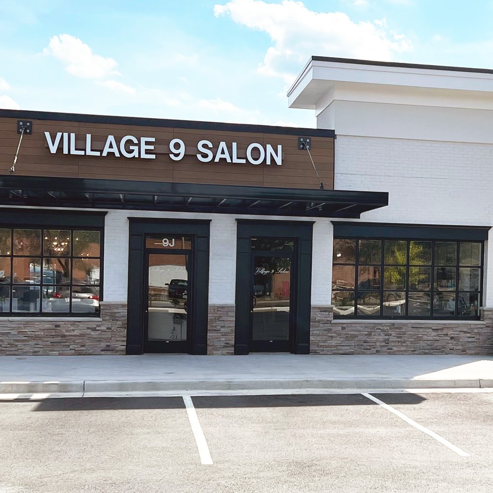 Village 9 Salon Logo