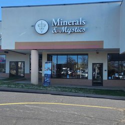 Minerals & Mystics - Storefront of our new location near Sushi King, The Barber's Den and Nail Expo