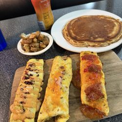 Dixie Restaurant - Omelet flight with pancakes