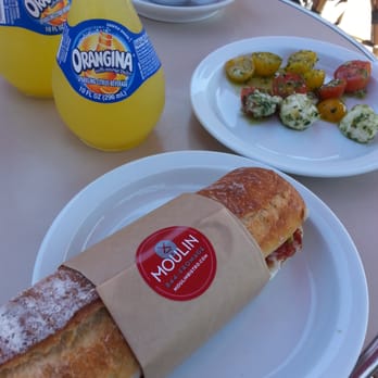 Moulin - Salami sandwich with tomato mozzarella salad and my favorite, Orangina. - Bakeries Near Me - Newport Beach, California Moulin - Salami sandwich with tomato mozzarella salad and my favorite, Orangina. - Bakeries Near Me - Newport Beach, California