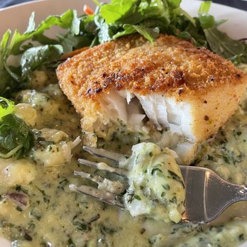 Dockside Bistro & Wine Bar - First bite of my pistachio crusted halibut. - New American Near Me - Olympia, Washington