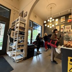 The French Guys - Seating area and merch!