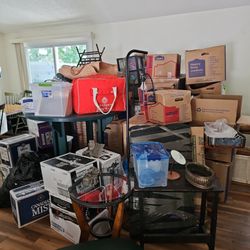 3 Brothers Moving & Storage - There's a fireplace mantle back there somewhere. Notice mashed up boxes etc.