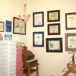 Certificates of appreciation and recognition praising Bakery for their longevity.