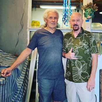 Strini Art Glass - Rick Strini with chandelier & Maui Plate at his Haiku Studio Maui Strini Art Glass @rickstrini #striniartglass - Arts & Crafts Near Me - Haiku, Hawaii