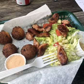Bayou Bites - Crawfish-Pork Sausage PoBoy basket with side of hush-puppies - Cajun/Creole Near Me - Dunedin, Florida Bayou Bites - Crawfish-Pork Sausage PoBoy basket with side of hush-puppies - Cajun/Creole Near Me - Dunedin, Florida