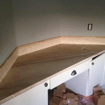 Austin Granite Direct - Marble bathroom counters and tile backsplash install - Building Supplies Near Me - Austin, Texas