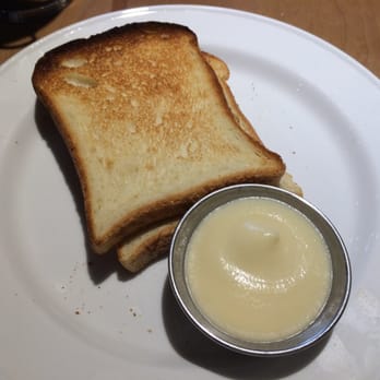 Cochon Dingue - Toasted gluten-free bread with apple butter, my favorite part! - Breakfast & Brunch Near Me - Quebec City, Quebec Cochon Dingue - Toasted gluten-free bread with apple butter, my favorite part! - Breakfast & Brunch Near Me - Quebec City, Quebec