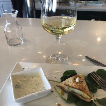 Ember & Greens - Samosas- cucumber yogurt dressing is a must!! - New American Near Me - Houston, Texas