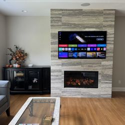 Tech Yeah Smart Solutions - LG OLED mounted over a fireplace