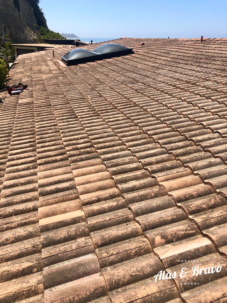 Slide of Alas & Bravo Roofing Company