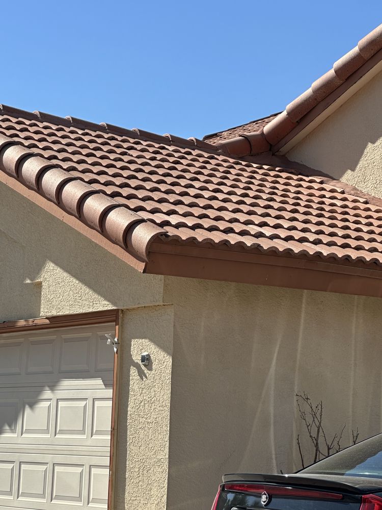 Slide of Mann & Sons Roofing