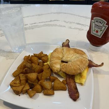 Canopy Road Cafe - Egg sandwich and breakfast potatoes - Breakfast & Brunch Near Me - Jacksonville, Florida