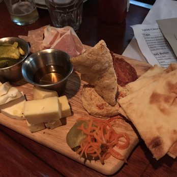 1608 Crafthouse - The fantastic charcuterie plate.  The cheeses on here were absolutely delish! - Gastropubs Near Me - Virginia Beach, Virginia