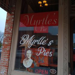 Myrtle's Pies - The sign in the store's window.