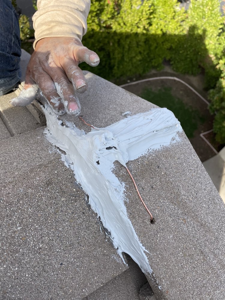 Slide of LXS Roofing