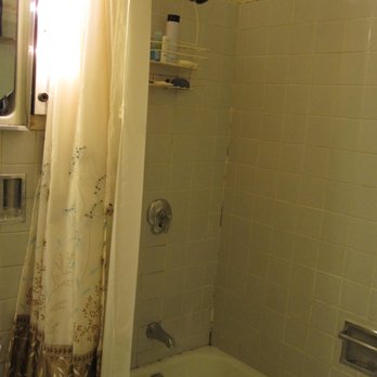 IRPINO Construction - Gross.  Tub was sledge hammered out in less than a day, followed by the cemented in floor tile.  Hard work. - General Contractors Near Me - Chicago, Illinois