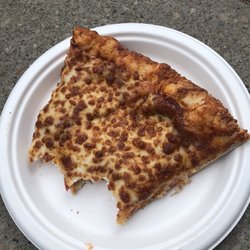 Cosmic Pizza & Donair - Cheesy pizza slice