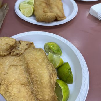 Fancy Fish - a plate of fried fish and limes - Seafood Near Me - West New York, New Jersey Fancy Fish - a plate of fried fish and limes - Seafood Near Me - West New York, New Jersey