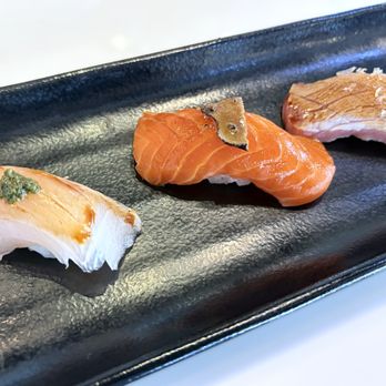 Izumi Sushi - nigiri made with shimaaji , king salmon and chutoro - Japanese Near Me - Littleton, Colorado Izumi Sushi - nigiri made with shimaaji , king salmon and chutoro - Japanese Near Me - Littleton, Colorado