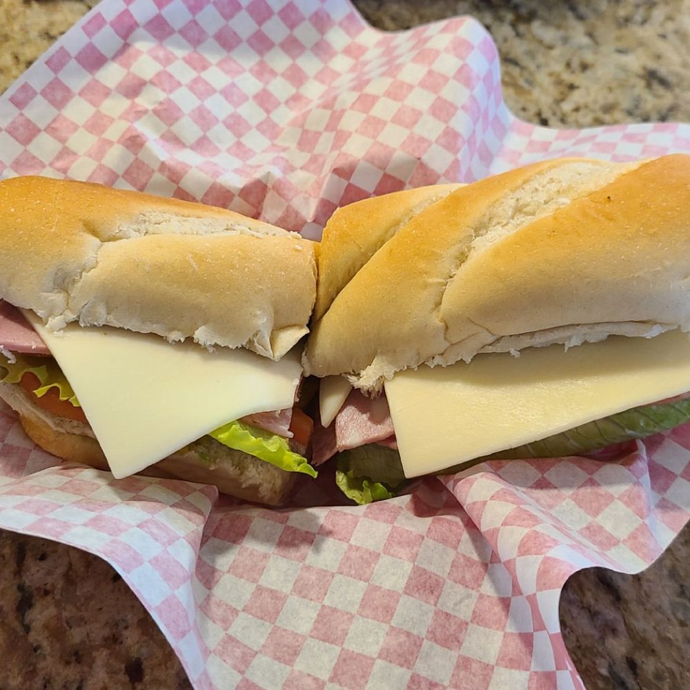 The Sandwich Mafia - The Uncle Tony: salami, pepperoni, mortadella, provolone, lettuce, tomato, pepperoncini, black olives, and oil & vinegar on a hoagie. - Italian Near Me - Estes Park, Colorado The Sandwich Mafia - The Uncle Tony: salami, pepperoni, mortadella, provolone, lettuce, tomato, pepperoncini, black olives, and oil & vinegar on a hoagie. - Italian Near Me - Estes Park, Colorado