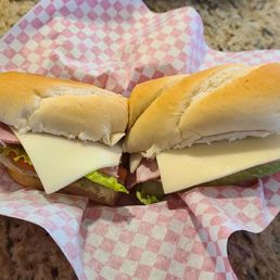 The Uncle Tony: salami, pepperoni, mortadella, provolone, lettuce, tomato, pepperoncini, black olives, and oil & vinegar on a hoagie. The Uncle Tony: salami, pepperoni, mortadella, provolone, lettuce, tomato, pepperoncini, black olives, and oil & vinegar on a hoagie.