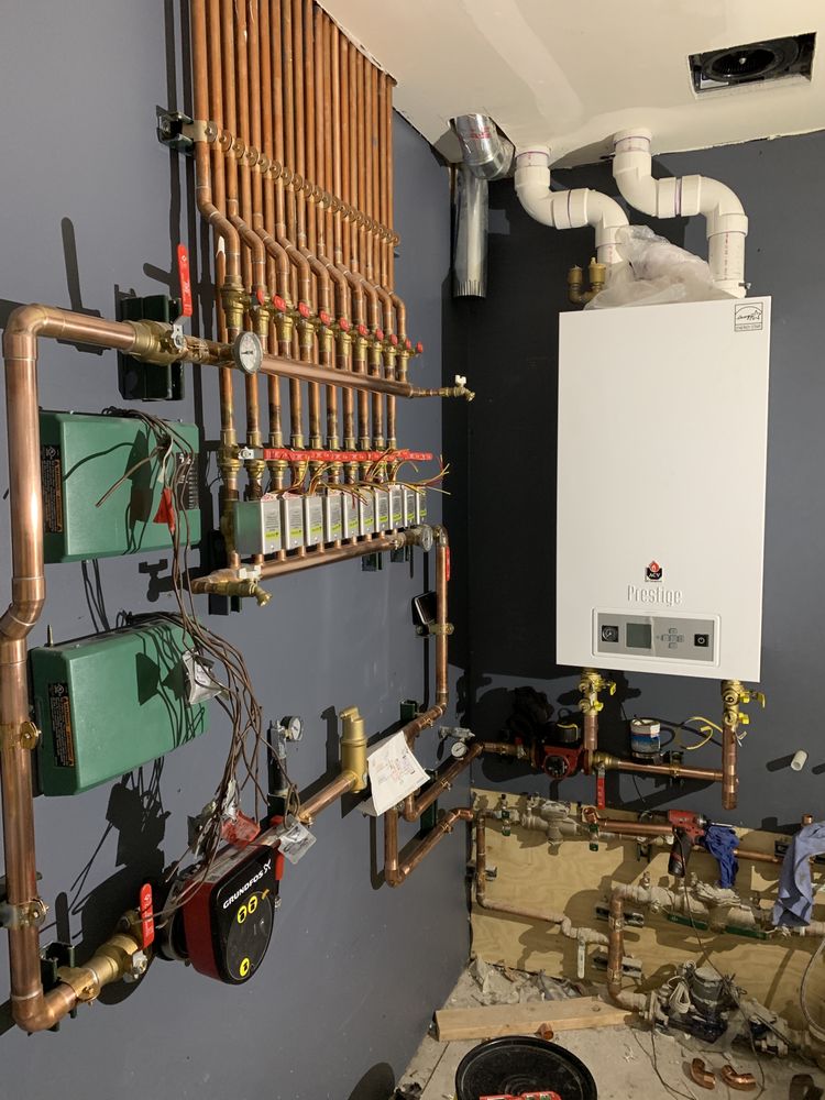 Slide of Carlos' Plumbing and Heating