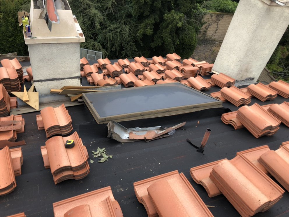 Slide of Frank Delgado Roofing