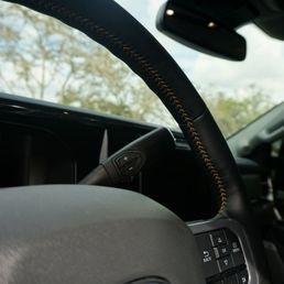 Custom stitching on steering wheel Custom stitching on steering wheel