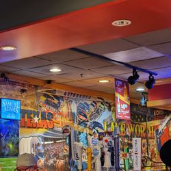 Beers on tap and cool art on the wall.