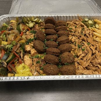 Taza Grill - Family tray, minus salad and hummus and garlic and bread, which came in different containers. - Lebanese Near Me - Southfield, Michigan