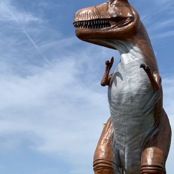 Dinosaur World - T Rex watching traffic. - Museums Near Me - Cave City, Kentucky