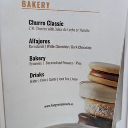 Happy Empanada - Menu displayed at the tables