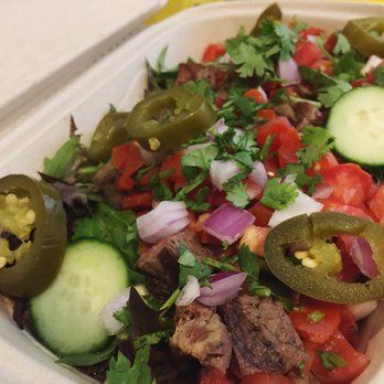 Guzman y Gomez - Mixed greens, pico de gallo, cucumber, corn + red onion, cilantro, med rare steak, jalapenos + smokey chipotle - Mexican Near Me - Carindale, QLD