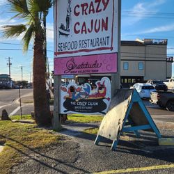 Crazy Cajun Seafood Restaurant - Sign out front on the street.