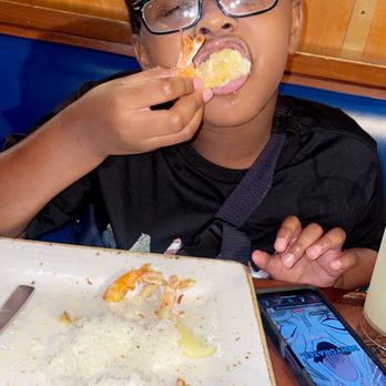 Bubba Gump Shrimp - Son enjoying stuffed shrimp - Seafood Near Me - Orlando, Florida Bubba Gump Shrimp - Son enjoying stuffed shrimp - Seafood Near Me - Orlando, Florida