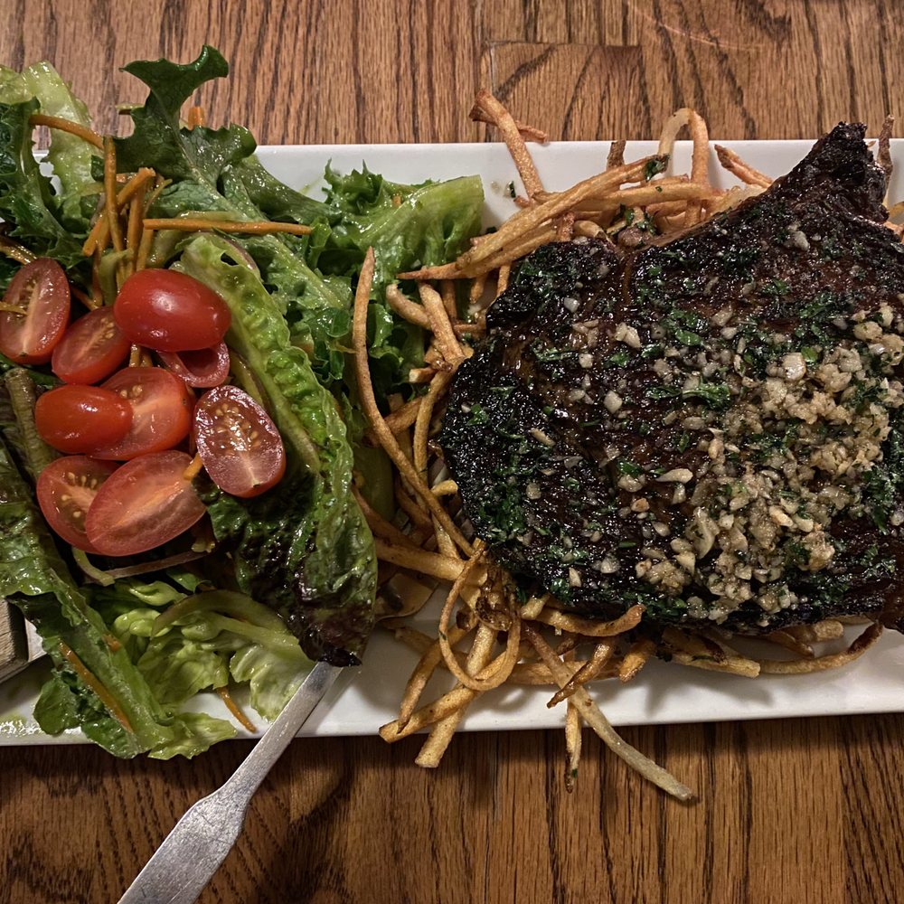 Chives Restaurant - Classic Steak Fritte - Seared Angus Beef Ribeye with a Sauce of Garlic, Herbs, & Butter with Chive Fries, & Greens Salad with French Herb Vi - New American Near Me - Suamico, Wisconsin Chives Restaurant - Classic Steak Fritte - Seared Angus Beef Ribeye with a Sauce of Garlic, Herbs, & Butter with Chive Fries, & Greens Salad with French Herb Vi - New American Near Me - Suamico, Wisconsin