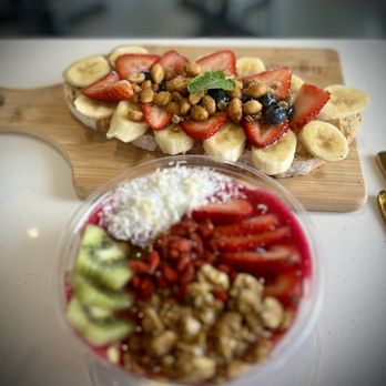 Toastique - a bowl of fruit and nuts on a cutting board - Juice Bars & Smoothies Near Me - Bakersfield, California Toastique - a bowl of fruit and nuts on a cutting board - Juice Bars & Smoothies Near Me - Bakersfield, California
