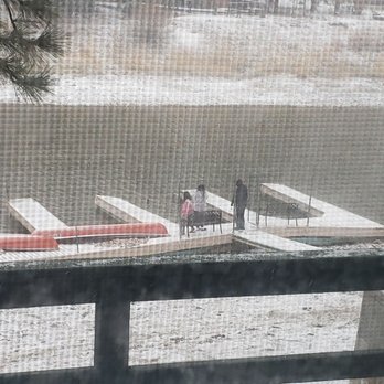 Noon Lodge at Mallard Bay - This is the view from our cabin's kitchen window we woke up to a snowy morning and wasn't even expecting snow. - Big Bear Lake, CA