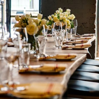 Sopra - Sopra dining table with flowers - Venues & Event Spaces Near Me - Manhattan, New York