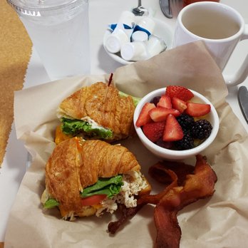 Roosters Restaurant - Turkey club croissant with avocado and fresh fruit. Bacon on the side - American Near Me - Pendleton, Oregon