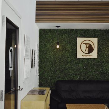The Pop Parlour - a couch and a coffee table - Coffee & Tea Near Me - Orlando, Florida The Pop Parlour - a couch and a coffee table - Coffee & Tea Near Me - Orlando, Florida