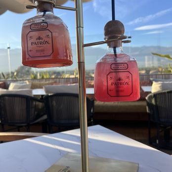Durango Cocina & Rooftop - Margarita Flight - can also do with 4 bottles. Approximately 2 drinks in each.   Watermelon on top, Prickly Pear below (and our fave) - Latin American Near Me - Rancho Cucamonga, California