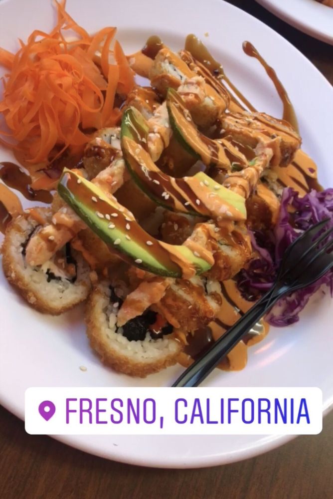 Mariscos El Sushi Express Logo