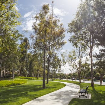 Villa Park Landscape - two people sitting on a park bench - Landscaping Near Me - Orange, California Villa Park Landscape - two people sitting on a park bench - Landscaping Near Me - Orange, California