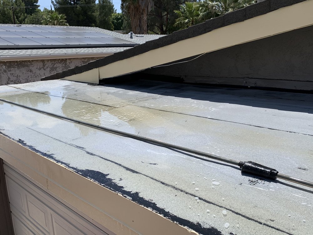 Slide of Ted Guilmette Roofing