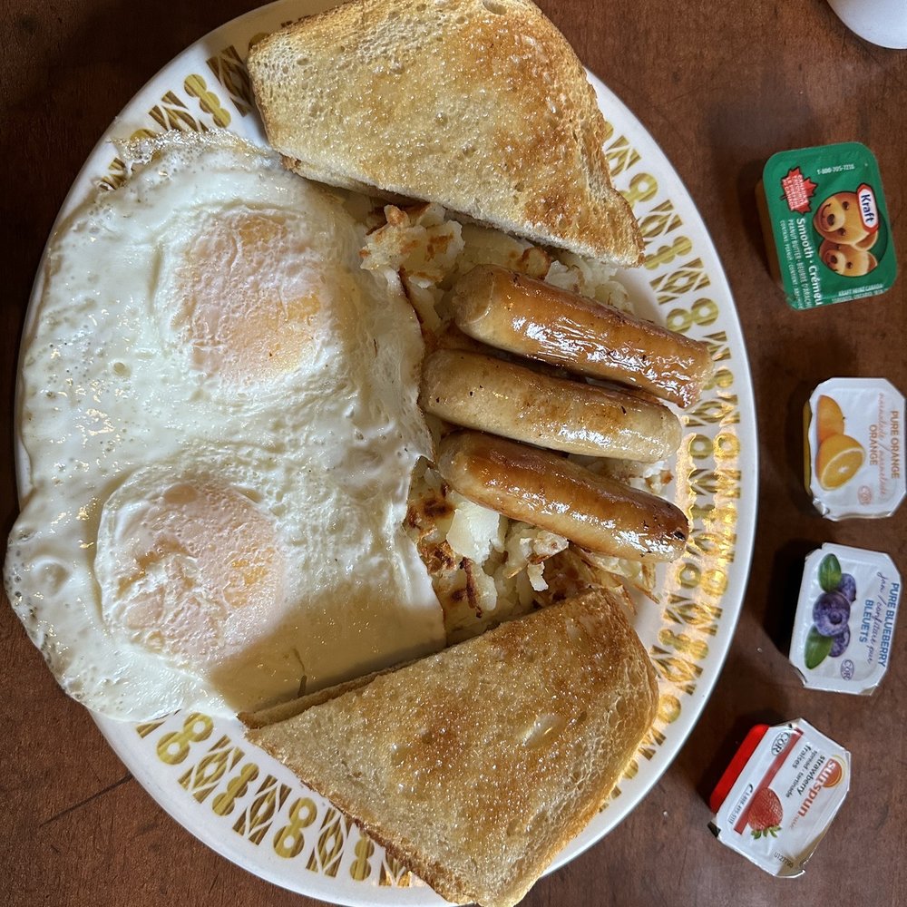 Village Restaurant - Sunrise breakfast with eggs over easy and sausage - Breakfast & Brunch Near Me - Sechelt, British Columbia Village Restaurant - Sunrise breakfast with eggs over easy and sausage - Breakfast & Brunch Near Me - Sechelt, British Columbia