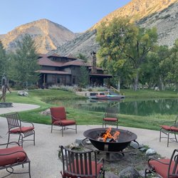 Branded Rock Canyon - Fire pit with main lodge in background. They served us appetizers out here!