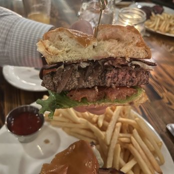 Zin American Bistro - original Zin burger: wagyu beef, caramelized red onions, fiscalini white cheddar, butter lettuce + tomato on a brioche bun = $30 - American Near Me - Palm Springs, California Zin American Bistro - original Zin burger: wagyu beef, caramelized red onions, fiscalini white cheddar, butter lettuce + tomato on a brioche bun = $30 - American Near Me - Palm Springs, California